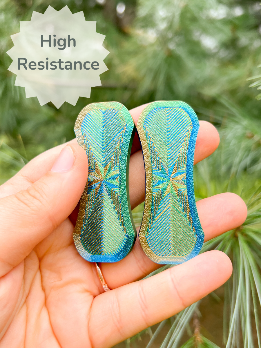 Print Pop Creations Magnetic Fidget Slider in Color Dragon Scales inside view in hand and green background