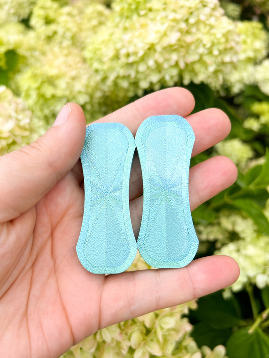 Teal blue magnetic fidget slider inside top view