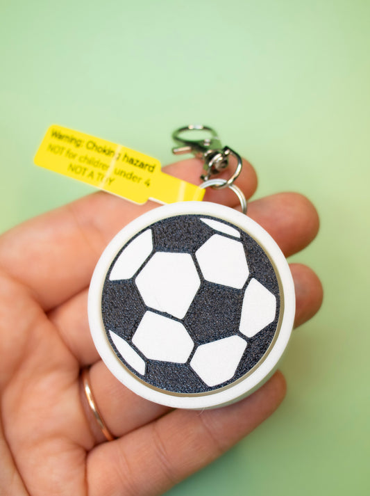 Soccer Ball Clicky Keychain Print Pop on green background